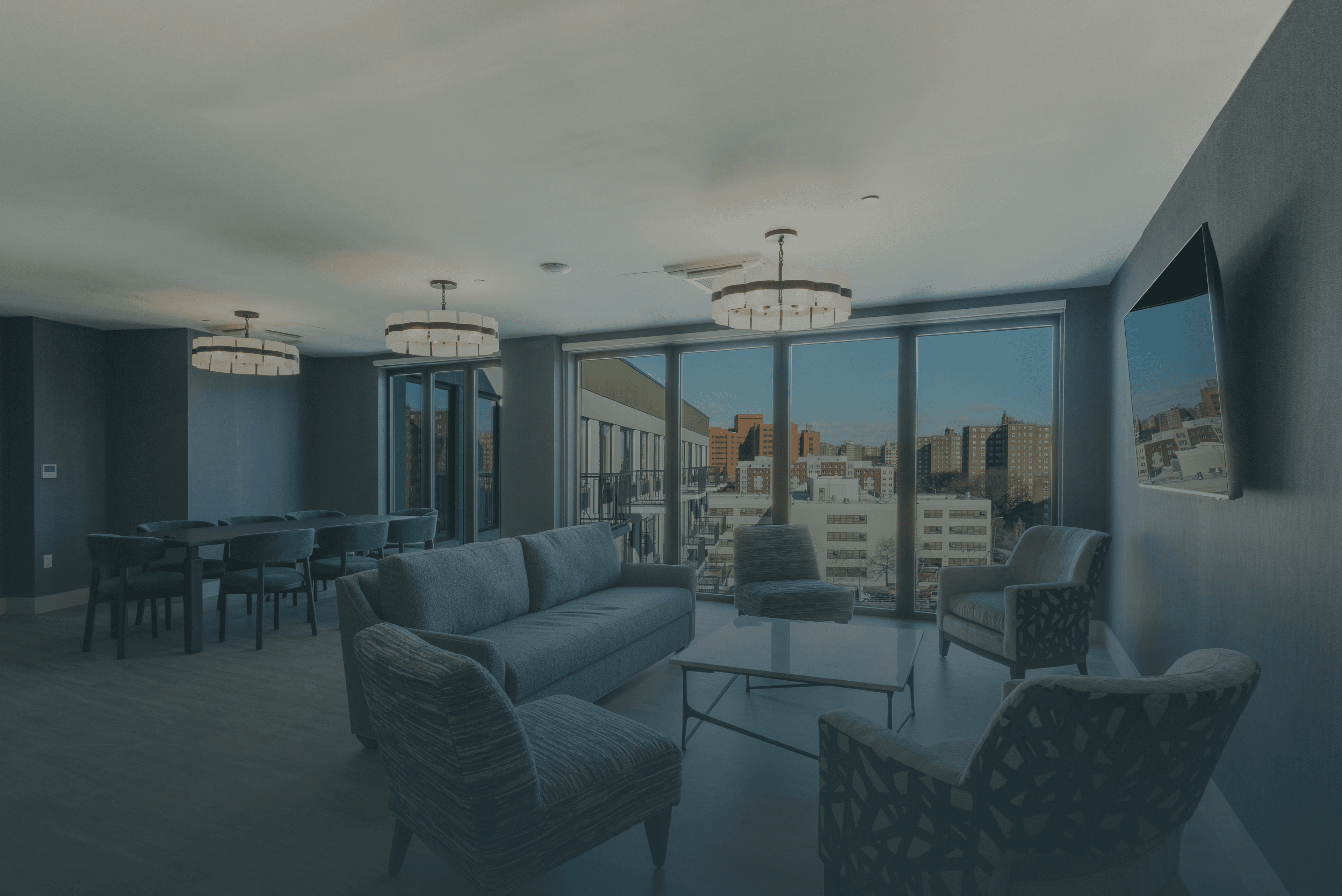 The resident lounge at The Astelle, with comfortable seating and warm light.